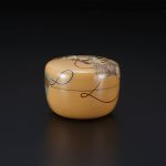 White Lacquered Tea Container With Design of Kimono Sleeves